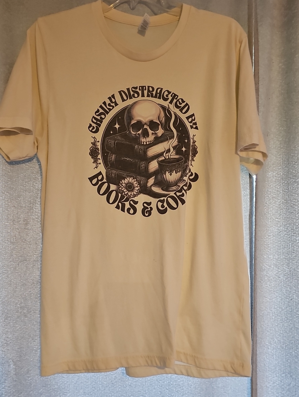 Bella Canvas Cream Graphic Tee - 'Easily Distracted By Books & Coffee'